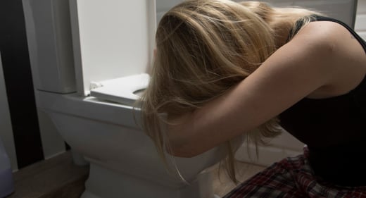 GettyImages-966271336-woman-toilet